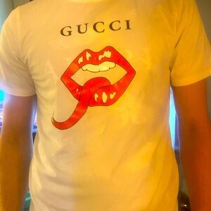 Gucci mens Xlarge Vintage white Tshirt with mouth design logo.